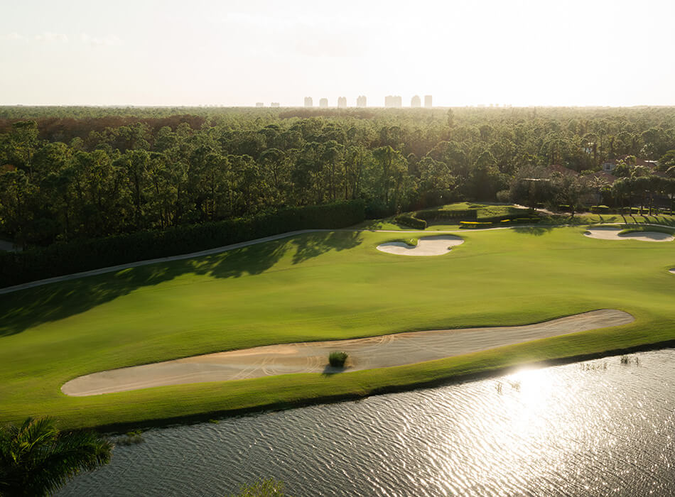 golf course fairway by water